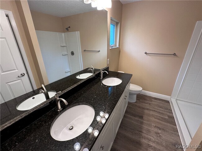 Building Photo - 7779 N Triana Dr