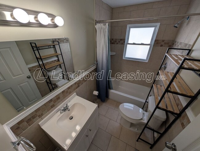 Building Photo - Updated 3-Bedroom Home with Private Upper Suite & Detached Garage