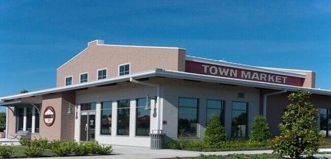 Building Photo - MOVE IN SPECIAL- 2 Bed / 2 Bath Condo with 1-Car Garage in Harmony – Move-In Special!