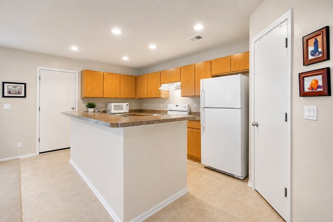 Building Photo - 3 Bedroom Townhome for Rent in Green Valley Ranch | Private Patio & Attached Garage