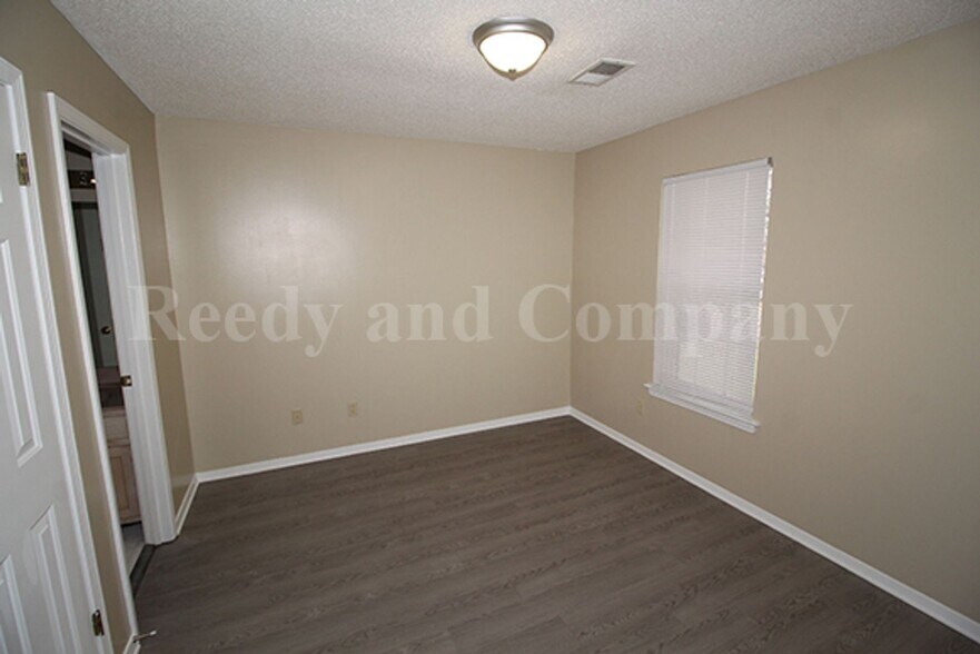 Building Photo - 8349 Honey Dew Cove