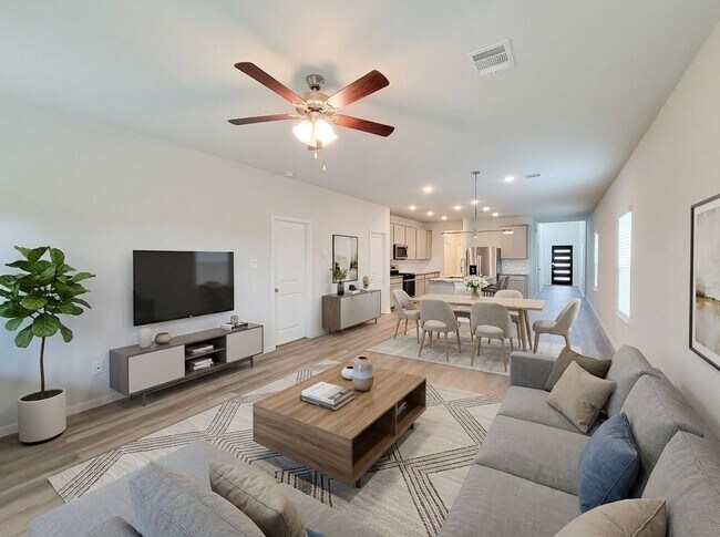 Building Photo - Welcome Home! Your never-lived-in sanctuary awaits your arrival. Have a large household? This 5-b...