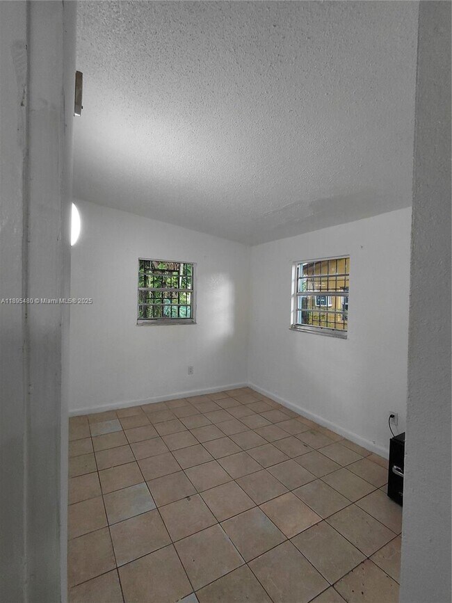 Building Photo - 7051 NW 21st Ave