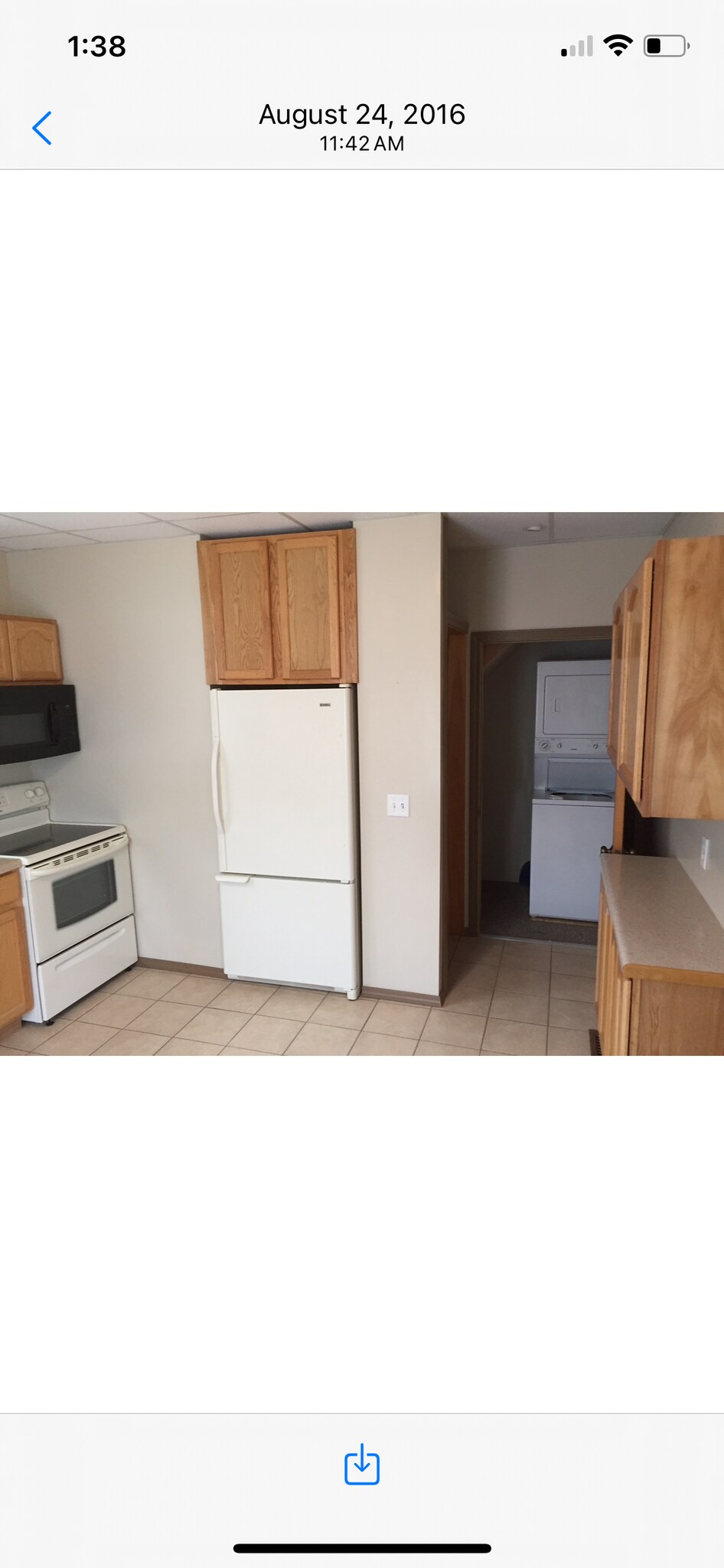Kitchen with stackable washer and dryer - 1309 1st Ave S