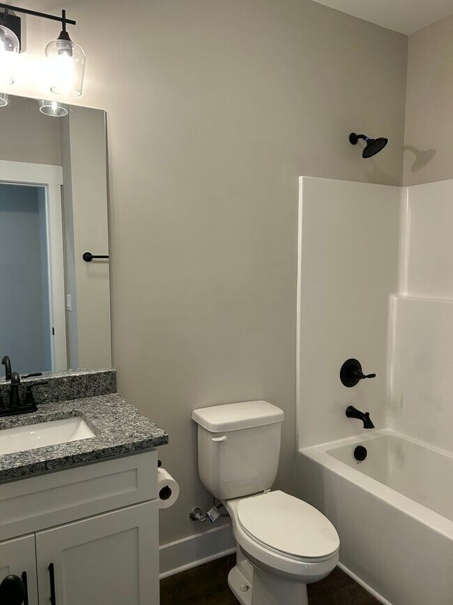 Building Photo - BRAND NEW Charming 2 Beds, 2 Baths, 1 Car ...