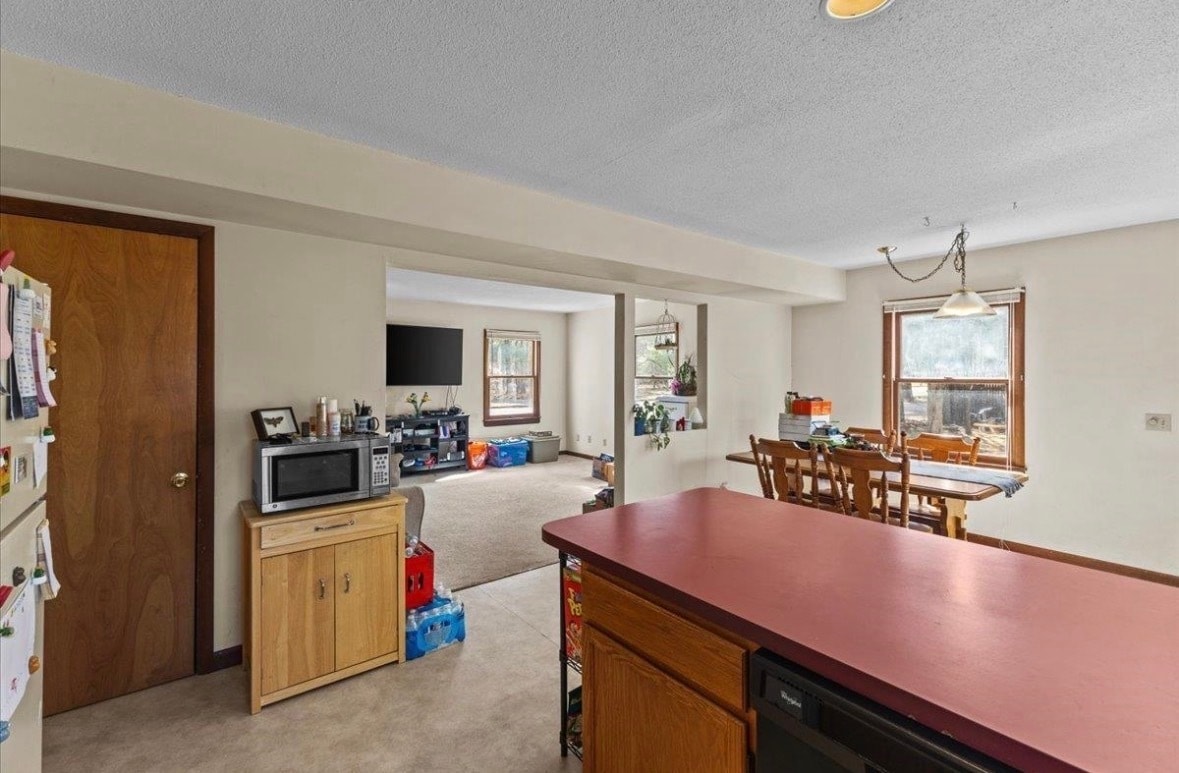 Kitchen view of dining area and living room - 216 Grey Birch Dr