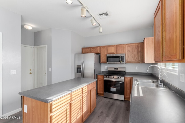 Building Photo - 11023 W Loma Ln