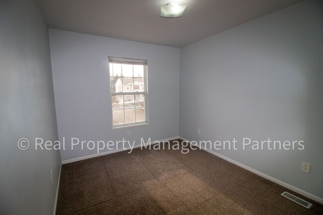 Building Photo - Forest Hills 3 Bed Townhome with Garage, Pond View and Some Utilities Included