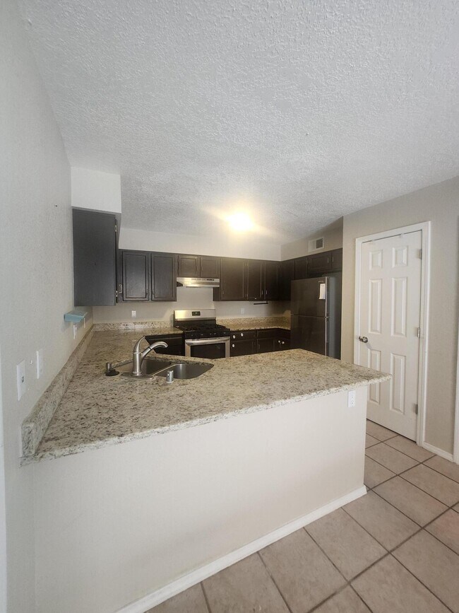 Building Photo - 7720 Ranchwood Dr NW