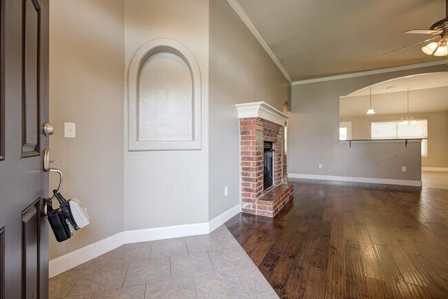 Building Photo - Spacious 4-Bedroom Home with Modern Upgrad...