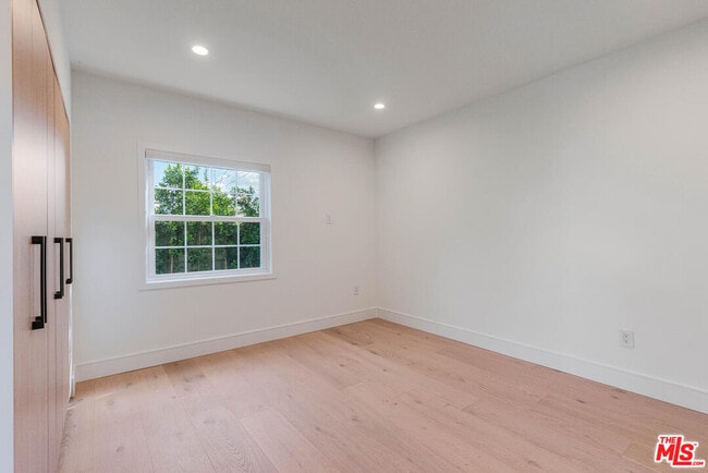 Building Photo - 5110 Garden Grove Ave