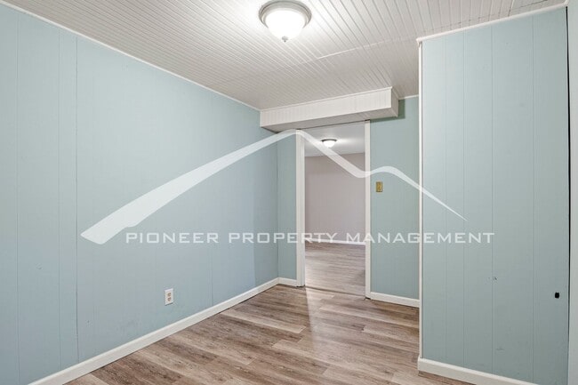 Building Photo - Spacious 4-Bed, 2-Bath Home with Finished ...