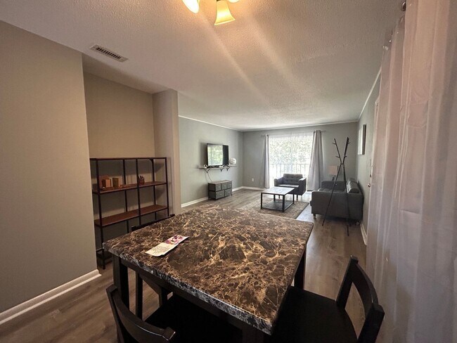 Building Photo - Adorable, Completely Furnished & Updated 2...