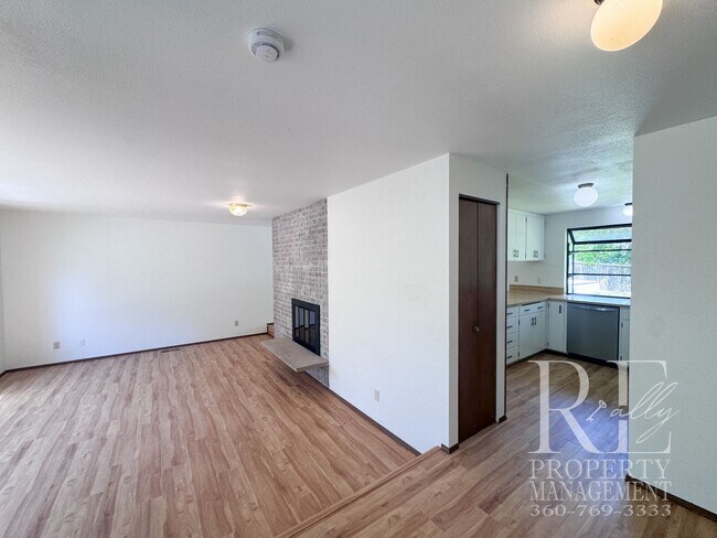 Building Photo - Spacious Poulsbo Home with Large Basement, Fenced Yard & Garden Space