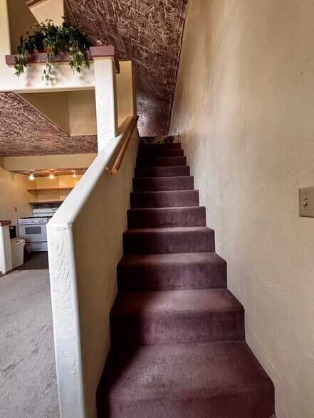 Stair access to loft bedroom - 3951 Stevensville River Rd