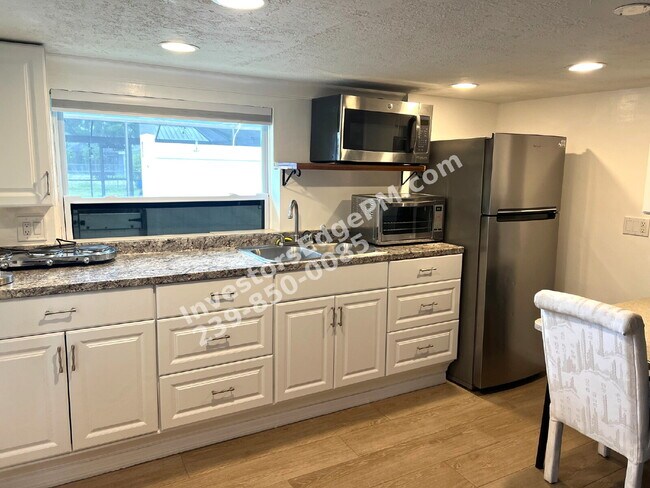 Building Photo - Furnished Waterfront Studio – Utilities Included – Direct River Access