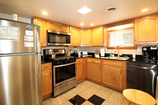 Modern kitchen with all stainless steel appliances - 78 Elm St