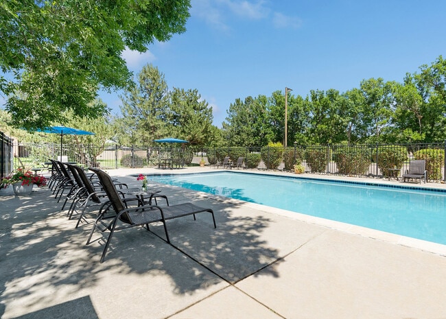 Beat the heat with a refreshing dip in our stunning pool — where every day feels like a vacation. - Glen Ridge Apartments