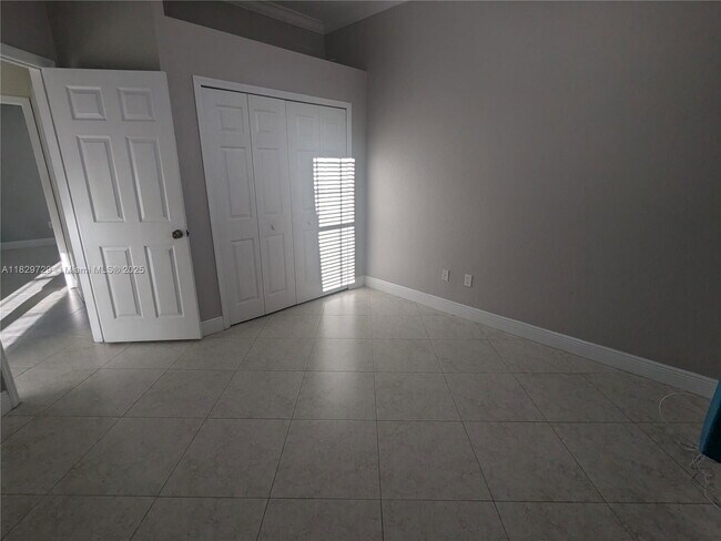 Building Photo - Northwest 91st Court, Hialeah Gardens, FL 33018 - 3 BR 1 BA single-family home