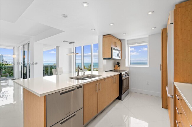 Building Photo - 10275 Collins Ave
