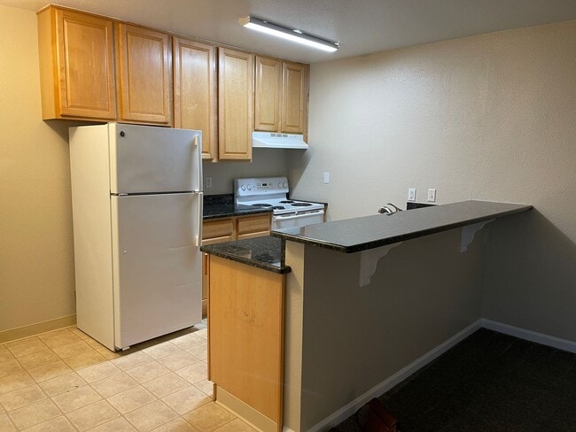 Building Photo - Chico 2 bed, one bath Duplex Private courtyard, Pool and Shared Laundry