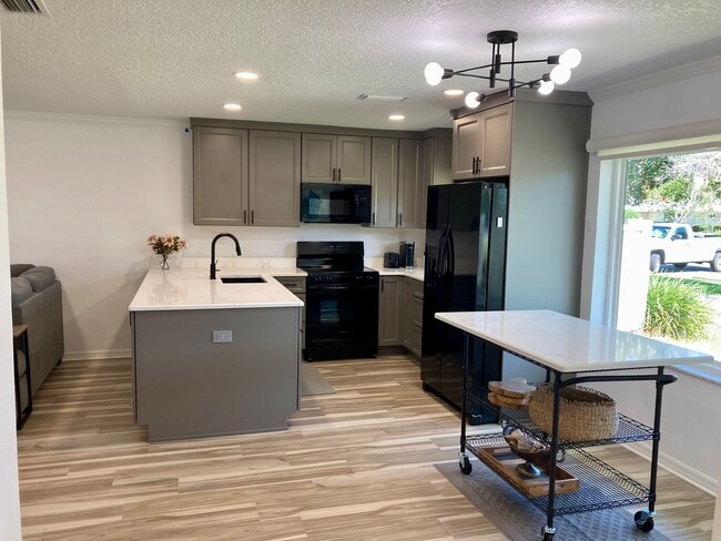 Building Photo - Completely remodeled waterfront condo!
