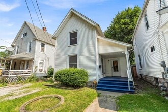 Building Photo - Charming Home with Updates and Covered Porch - A Must-See!