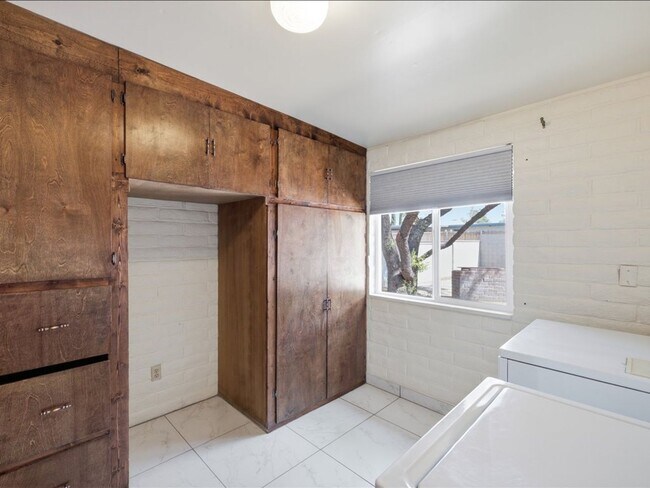 Building Photo - Concept Living with Large Enclosed Backyard & Modern Upgrades!