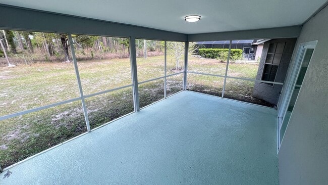 Building Photo - Bright & Spacious 3/2 Home with Huge Yard + Screened Patio — Lawn Care Included!