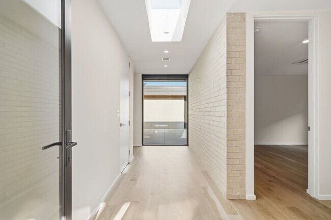 Building Photo - Experience contemporary luxury in this exceptional custom-built Midtown Tulsa residence, where so...