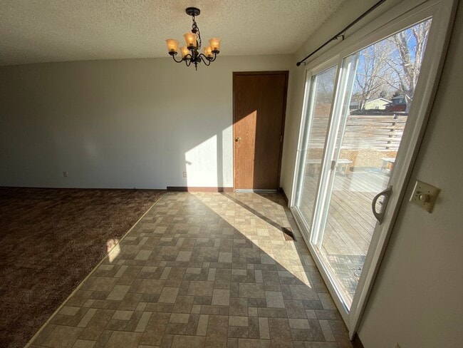 Building Photo - Cozy 3 Bedroom 1 Bath Home with Large Yard & 1 Car Attached Garage