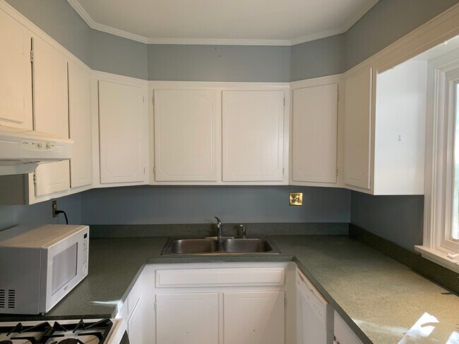Freshly painted cabinets - 5 Cliffholme Rd