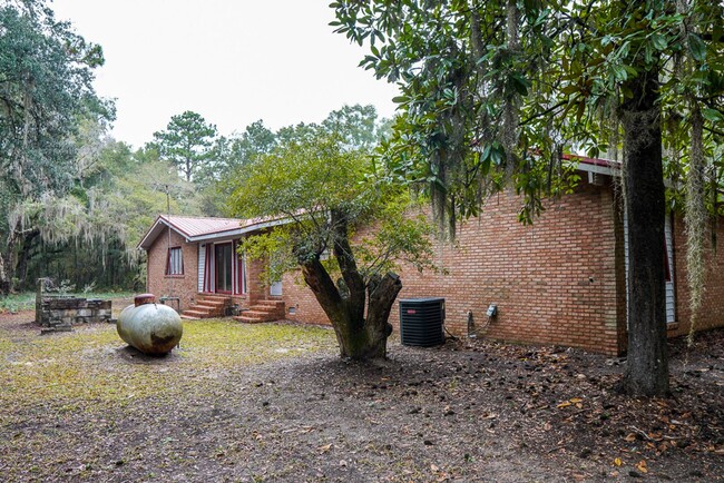 Building Photo - Tucked Away Three Bedroom Home