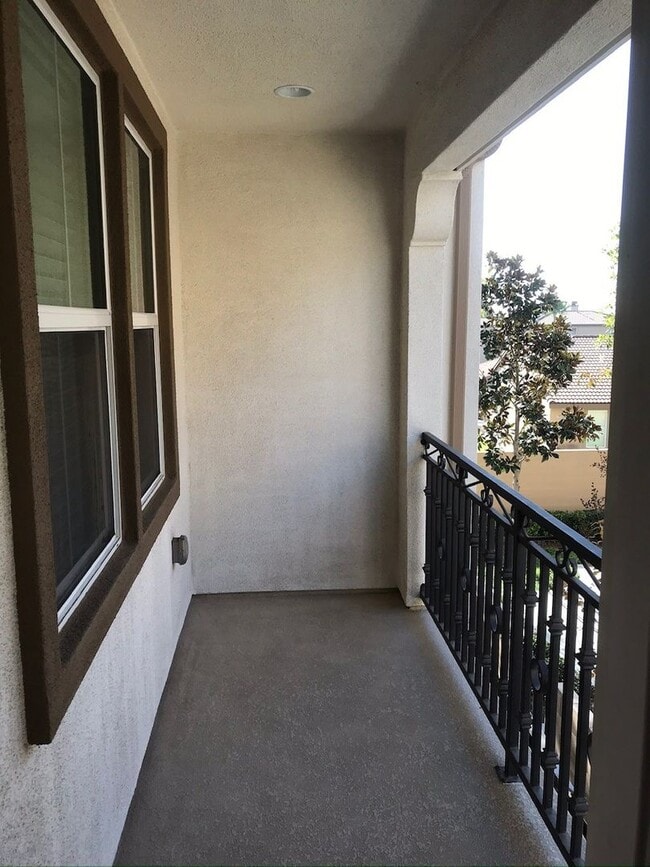 Building Photo - Beautiful 2 Bedroom Condominium with Attached Garage Located in Gated Community of Eastvale