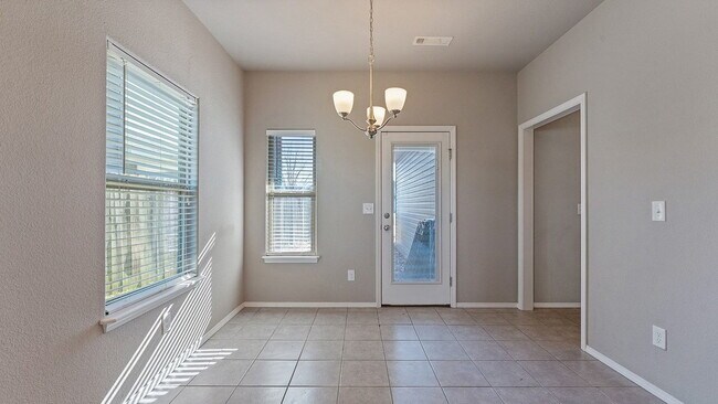 Building Photo - Spacious 4-Bedroom with Elegant Granite Finishes