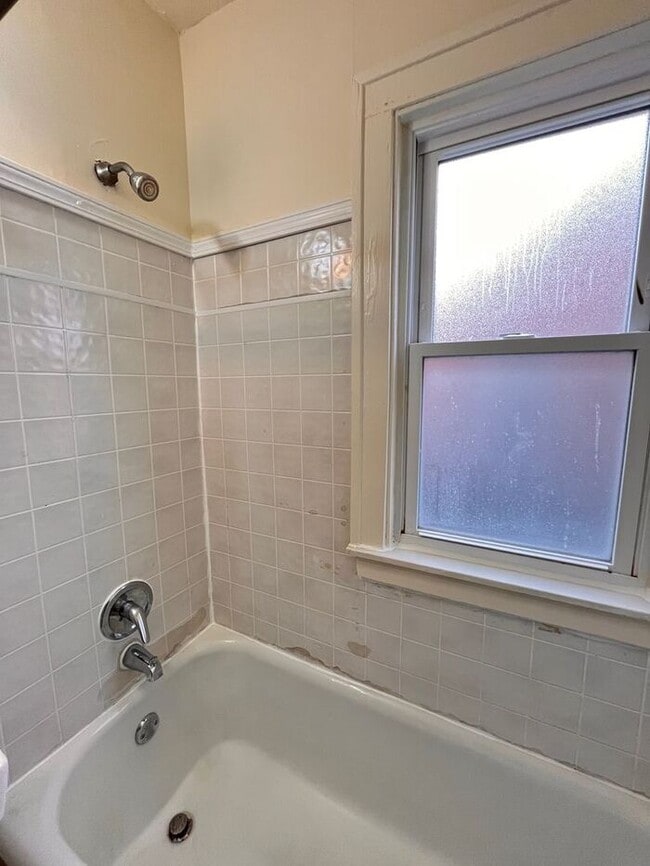 Building Photo - Cozy and Bright 2-Bedroom Duplex with Fire...