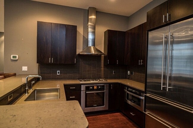 Building Photo - Luxury Penthouse Condo Downtown with Private Patio & Amazing Views Available Now!