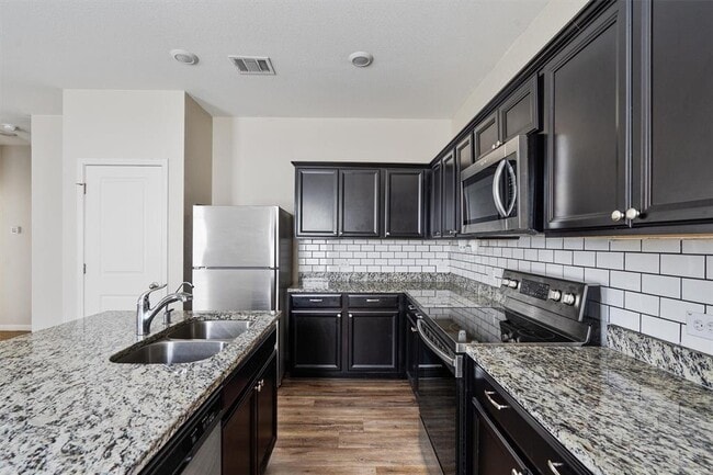 Building Photo - 205 Athena Way