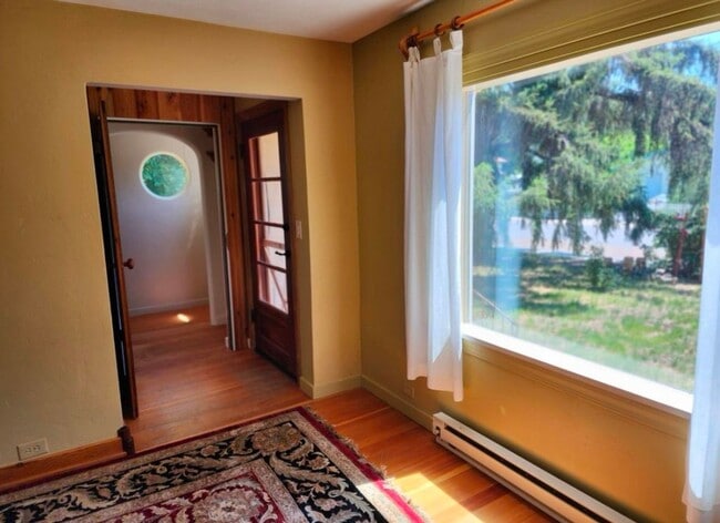 Building Photo - Renovated In-Town Home with Creek & Garage