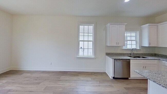 Building Photo - New build! 3/2 with backyard storage shed