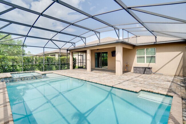 Building Photo - Stunning 3-Bedroom Pool Home with Bonus Room in the Gated Community of Lakeshore at Narcoossee
