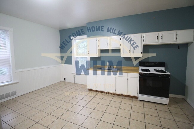 Building Photo - 1140 N 50th Pl