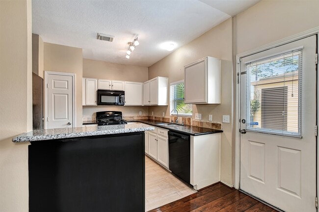 Building Photo - 23624 Wildwood Green Way