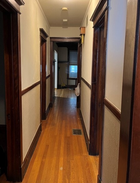 Wood detailing and trim - 6110 S Evans Ave