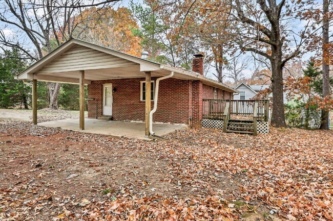 Building Photo - Cozy 3BR Home with Spacious Yard & XL Carport!