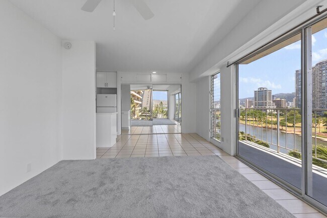 Building Photo - Waikiki 1BR/1BA with Ala Wai Canal & Mountain Views — Wraparound Lanai, Utilities Included