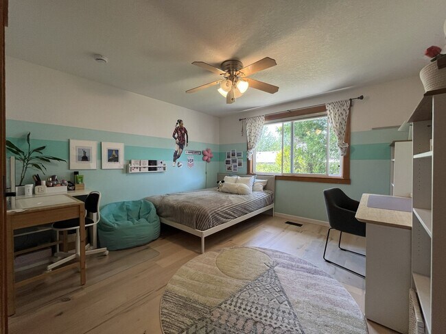 Building Photo - Bright and Open 4 Bedroom Cedar Mill Home with Vaulted Ceilings, Skylights & Multiple Living Areas