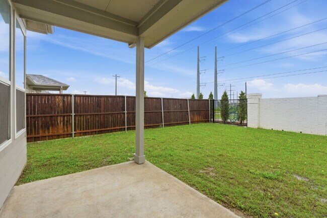 Building Photo - "Open-Concept 4-Bedroom, 2.5-Bath with Designer Finishes and Peaceful Greenbelt Views!"