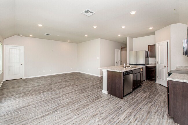 View from the Dining to Bedroom 1 to living to kitchen - 48465 Red Fox Dr