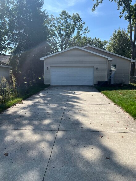 Two car garage with alley access - 214 W Sixteenth St